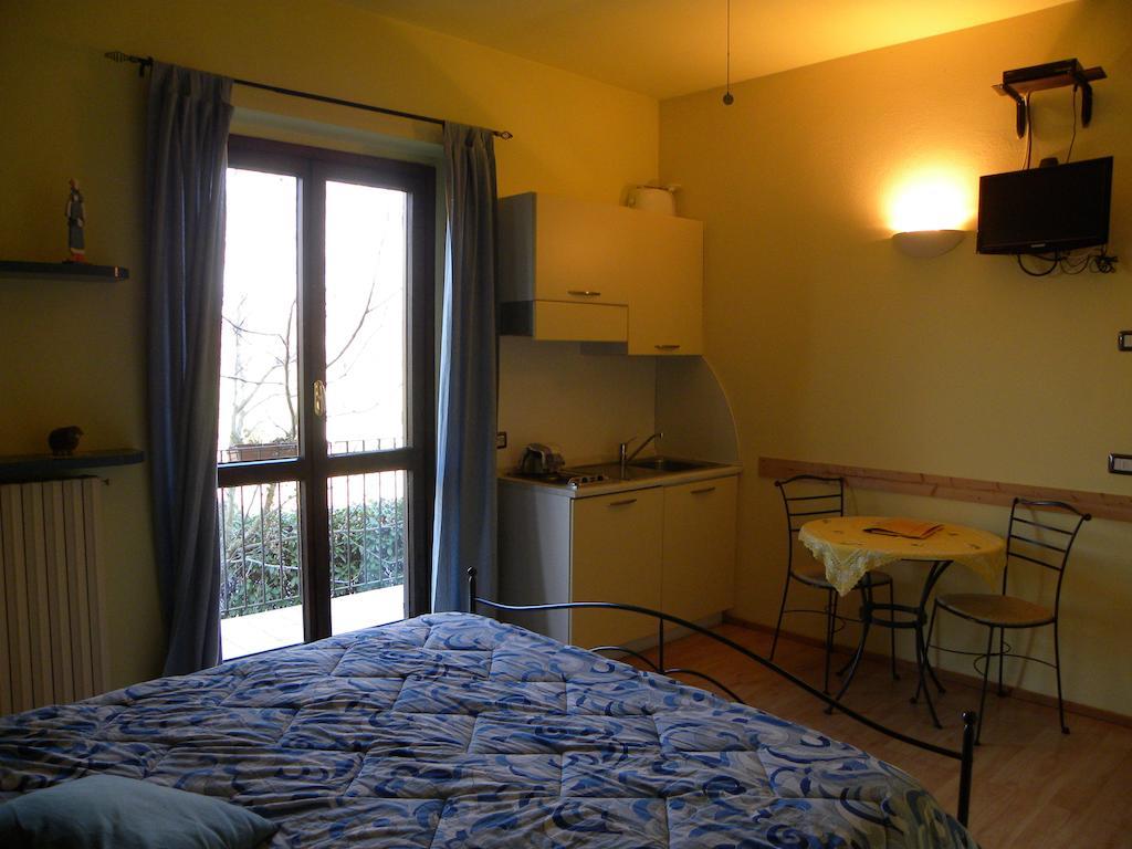Agriturismo Fano'S Farm Suno Bilik gambar